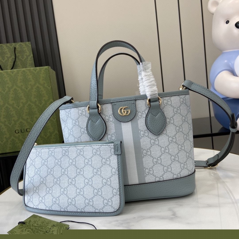 G*u*i shopping bags